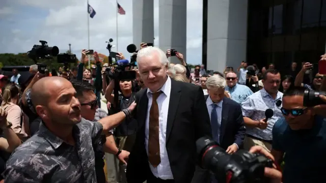 WikiLeaks founder Julian Assange makes his way as he leaves the United States District Court following a hearing, in Saipan, Northern Mariana Islands, U.S., June 26, 2024.