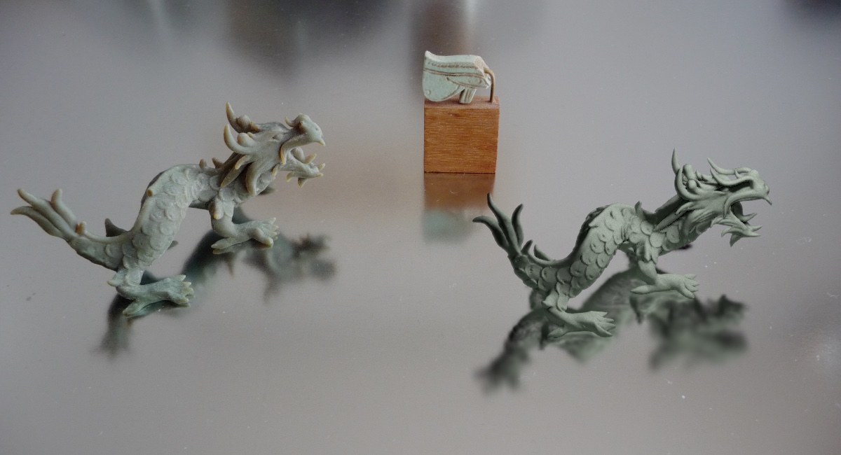 XYZRGB Dragon next to a 3D printed one