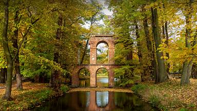 Roman-inspired aqueduct, Arkadia Park, Poland (© PATSTOCK/Getty Images)