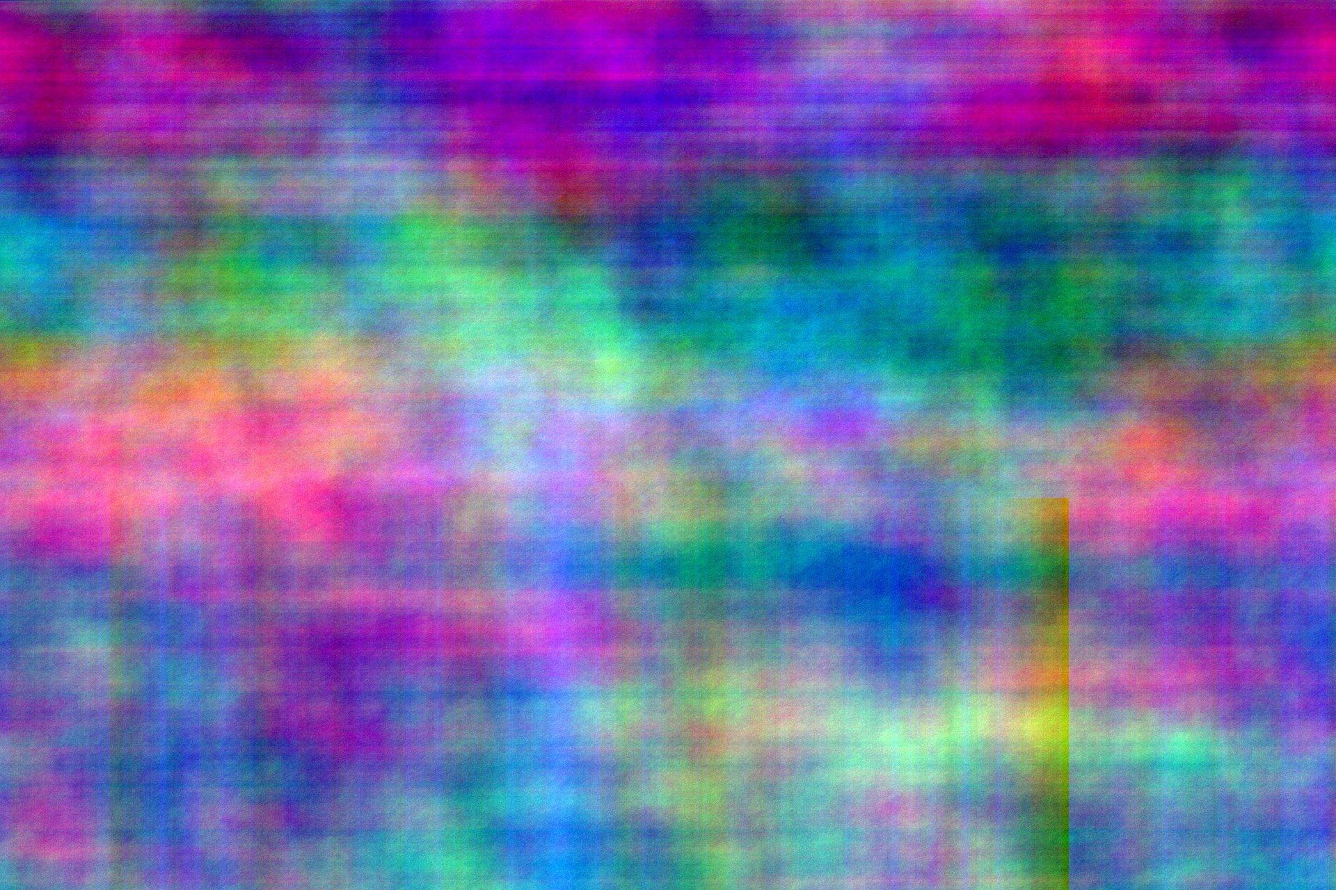 A colorful image. Halfway down the image, irregular blue vertical stripes show up.