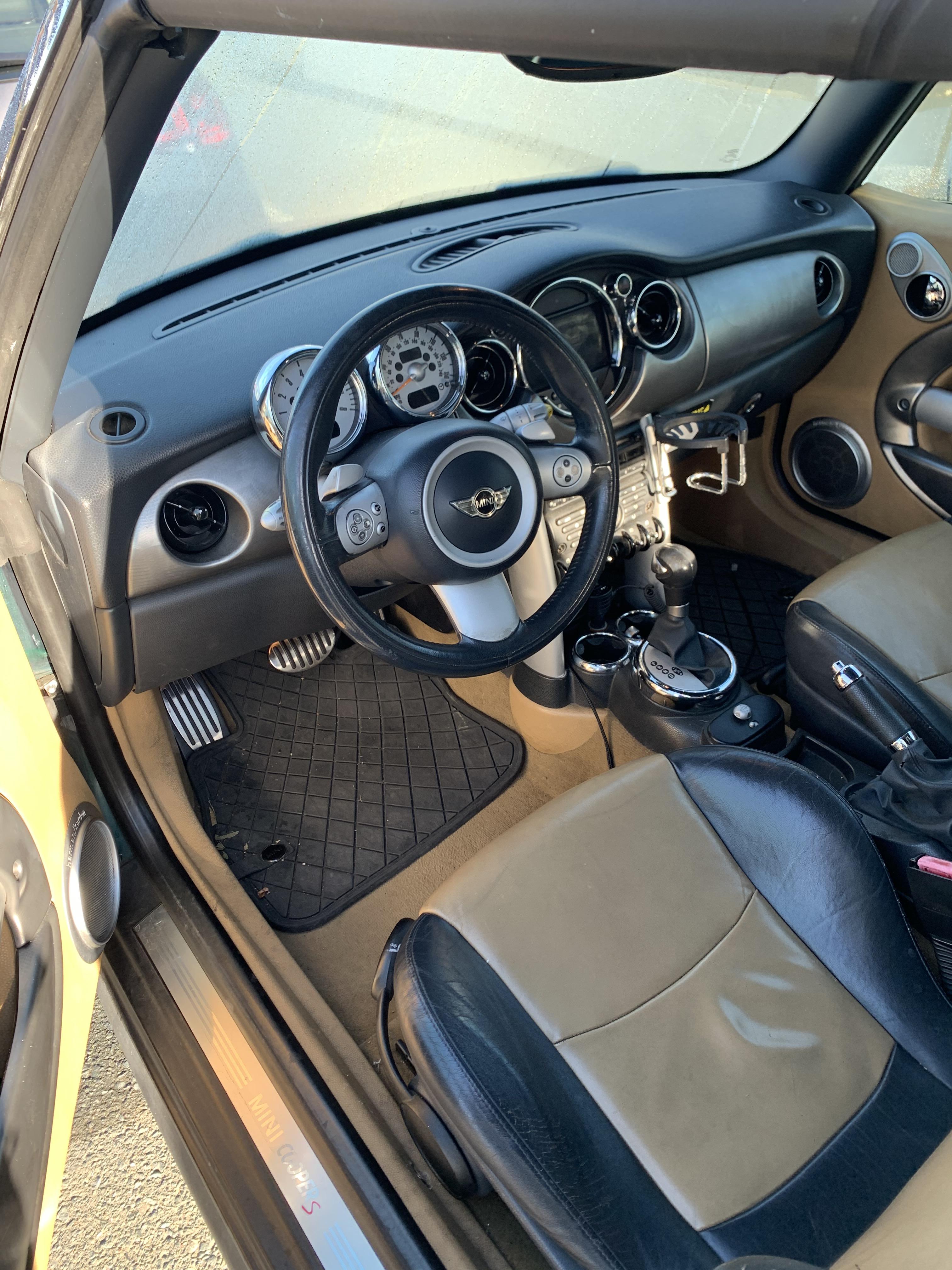 Pic of interior with auto shift knob and 2 pedals