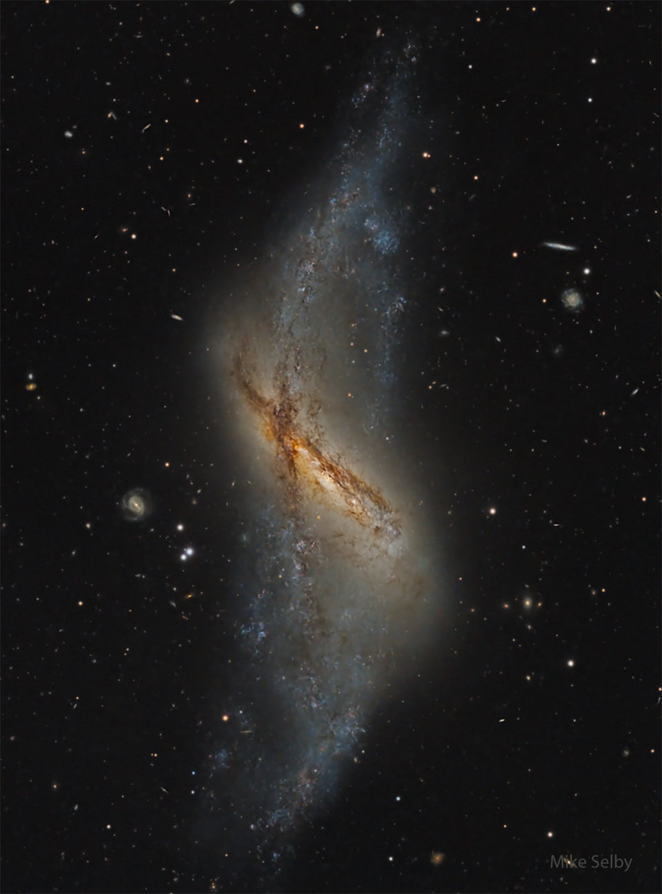 NGC 660: Polar Ring Galaxy image