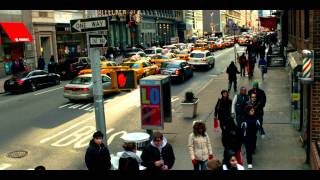 Royalty Free Stock Footage of Shops and people passing as camera moves, New York City.