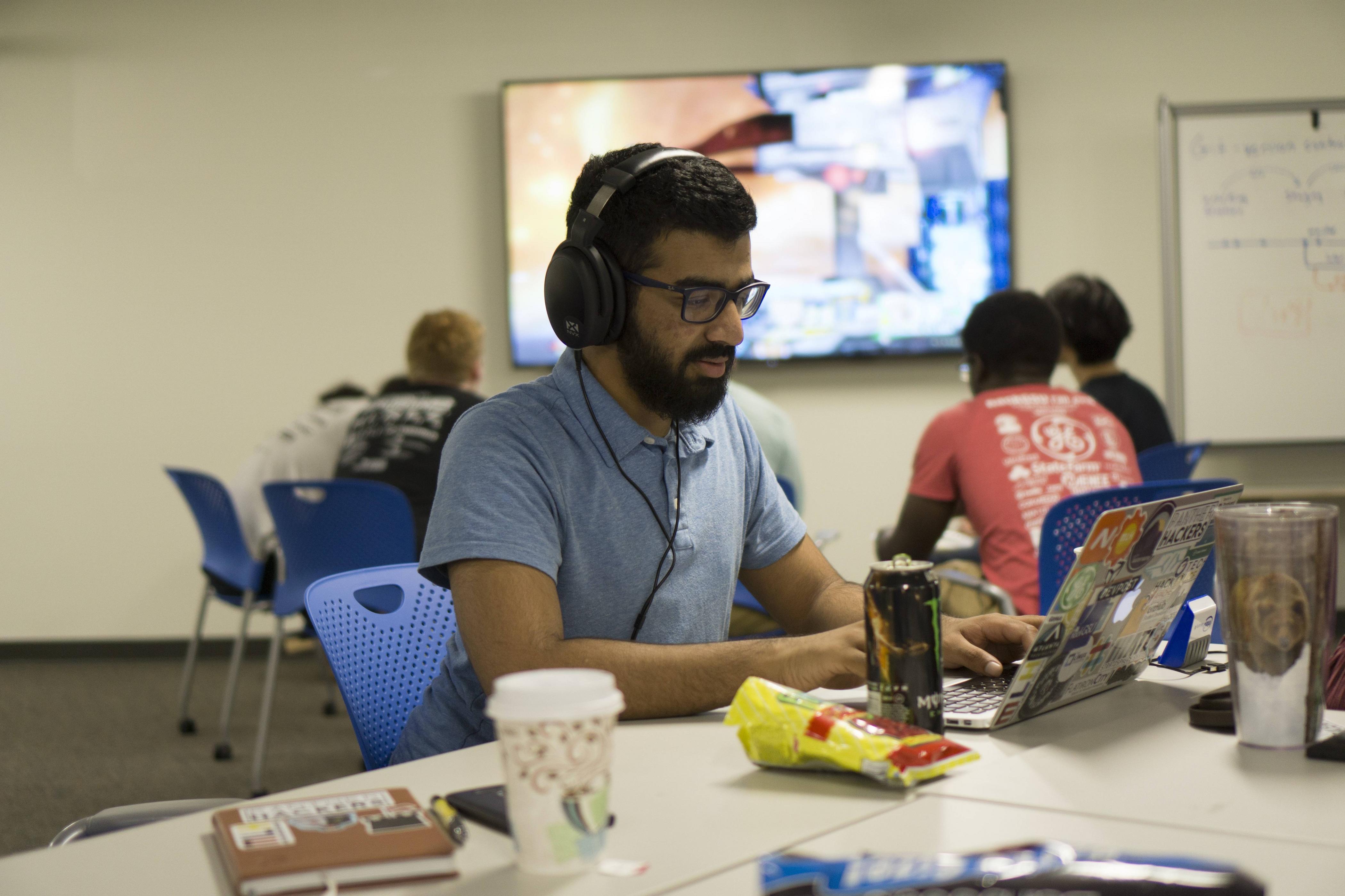 PantherHacker, Harsha, working on a project at Midnight Hacks