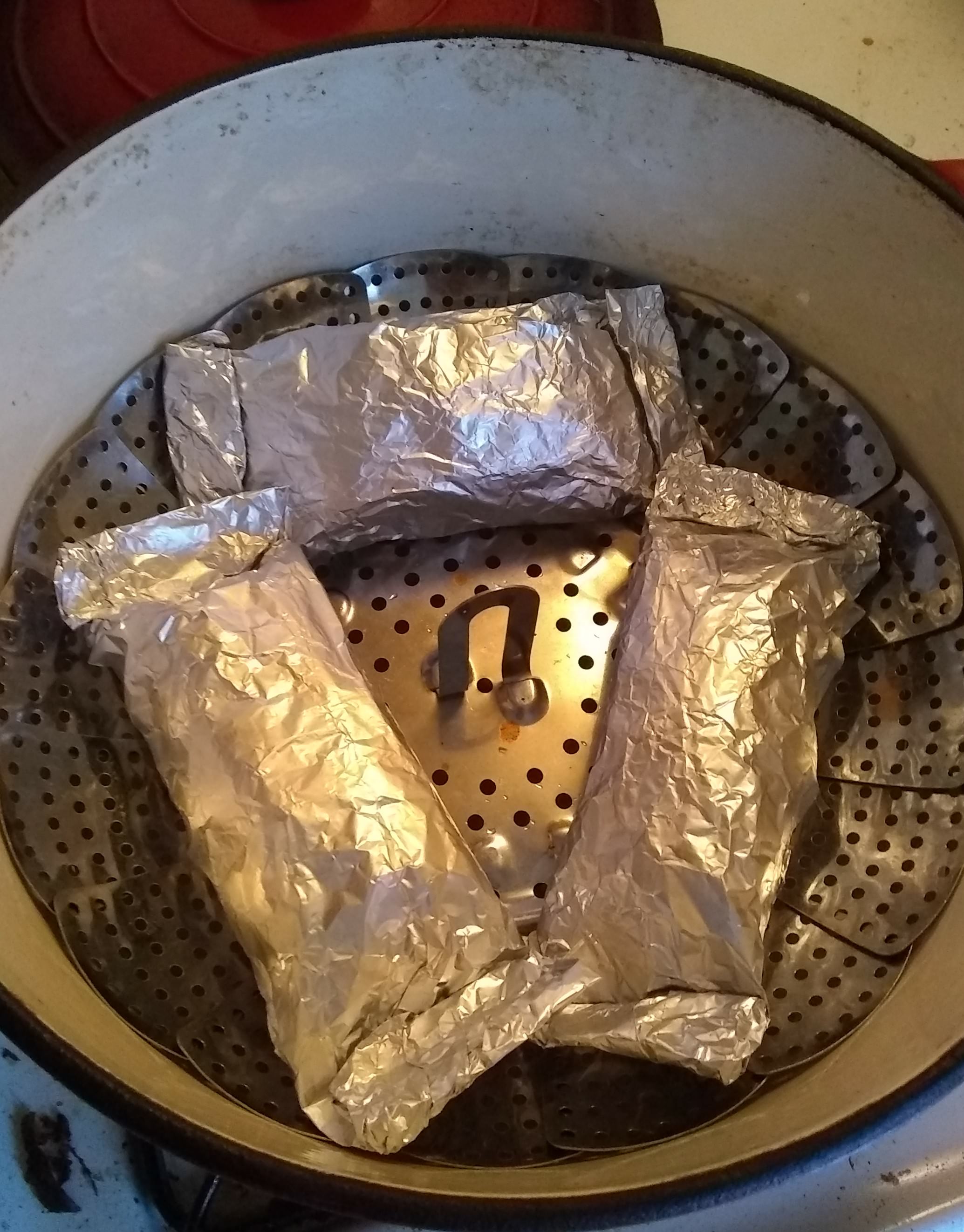 Image of tamales inside a steamer