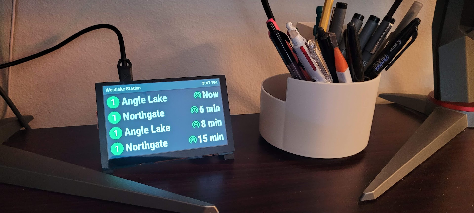 Raspberry Pi with display running arrivals board app