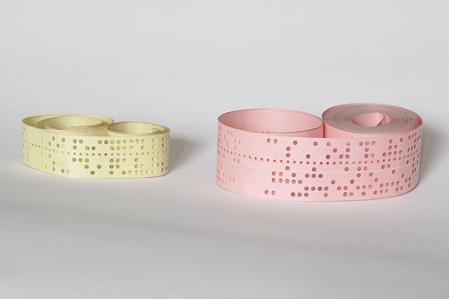 Five- and eight-hole punched paper tape