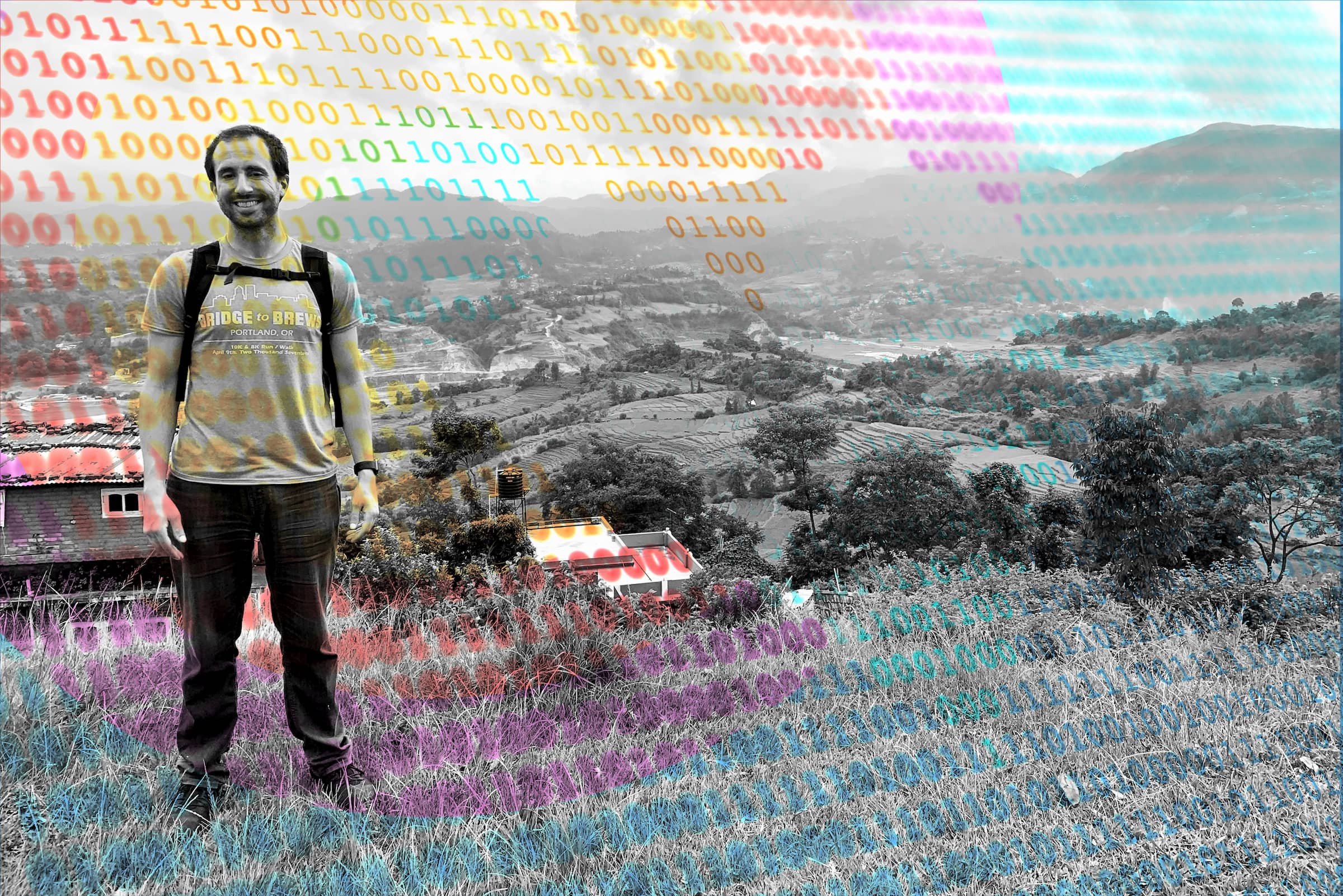 A black and white photo of George Mandis in Nepal with a stylized rainbow overlay of hearts made of 1s and 0s