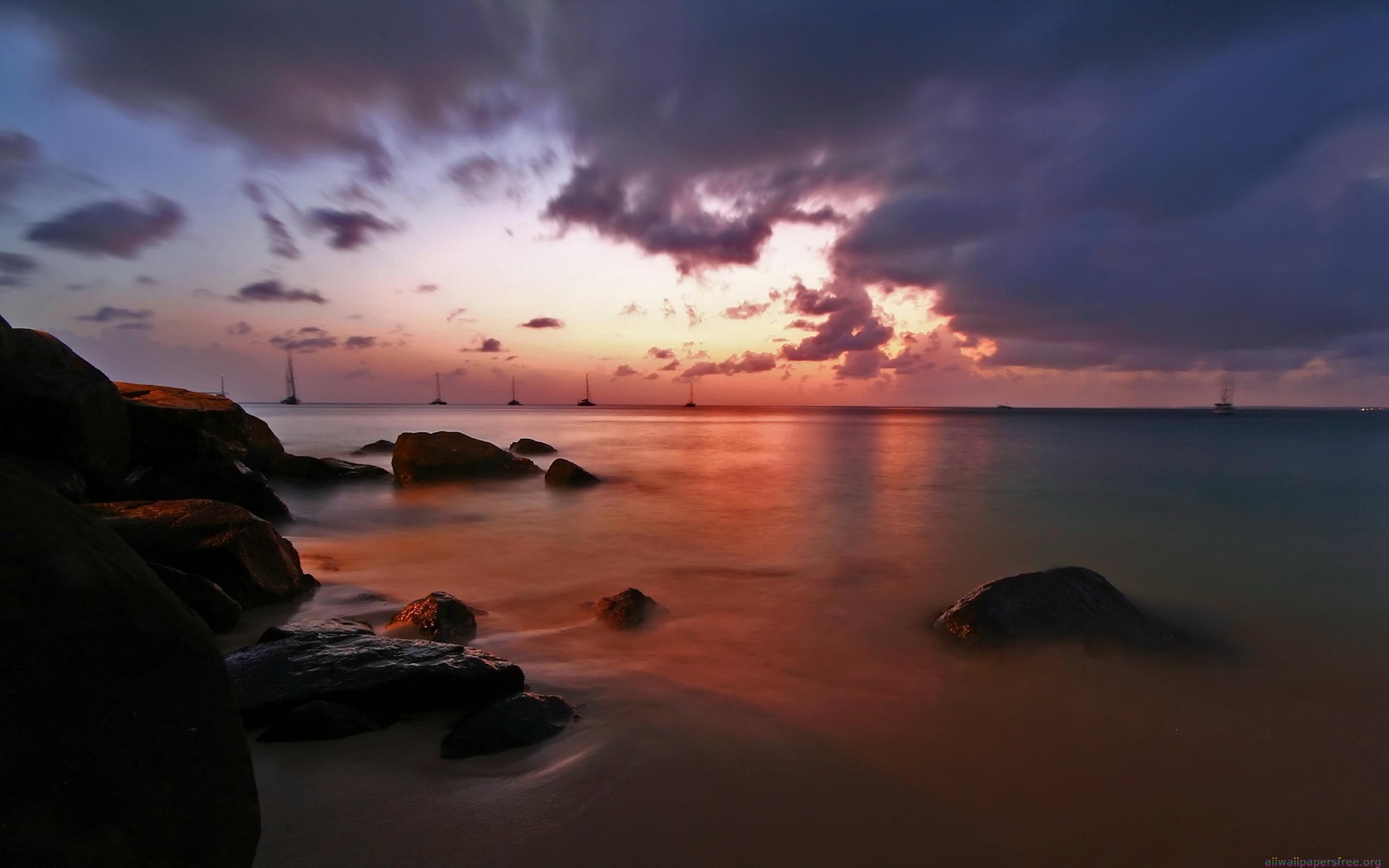 Here is a picture of a few rocks in the ocean