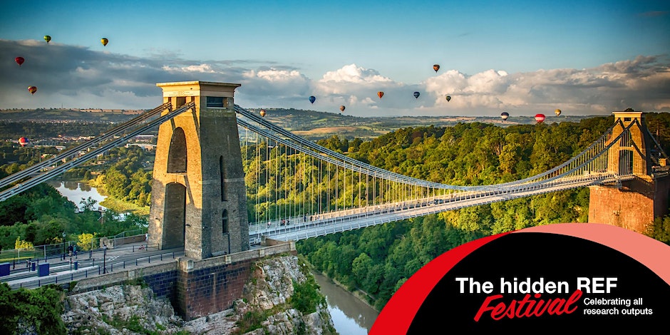 Alt: Image of the Clifton Suspension Bridge in Bristol, UK on a sunny day. There are air ballons in the distance and trees in the background, with a few clouds in the sky.