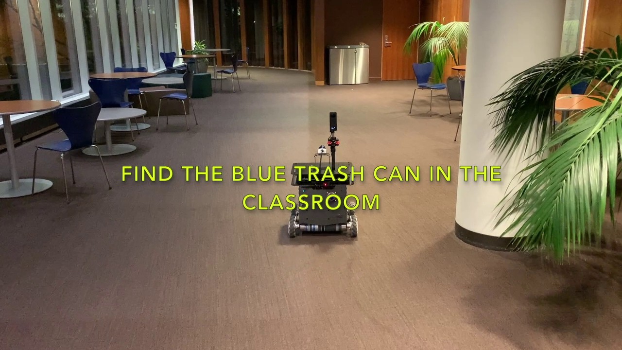 Find Blue Trash Can in Classroom