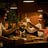 A small family — man, woman, and boy, clink glasses over a restaurant table. They all look relaxed and happy.