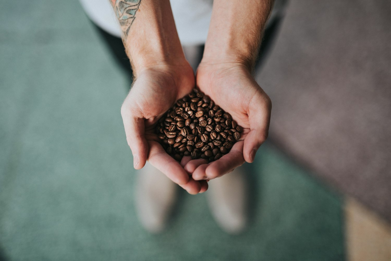 a handful of roasted coffee beans