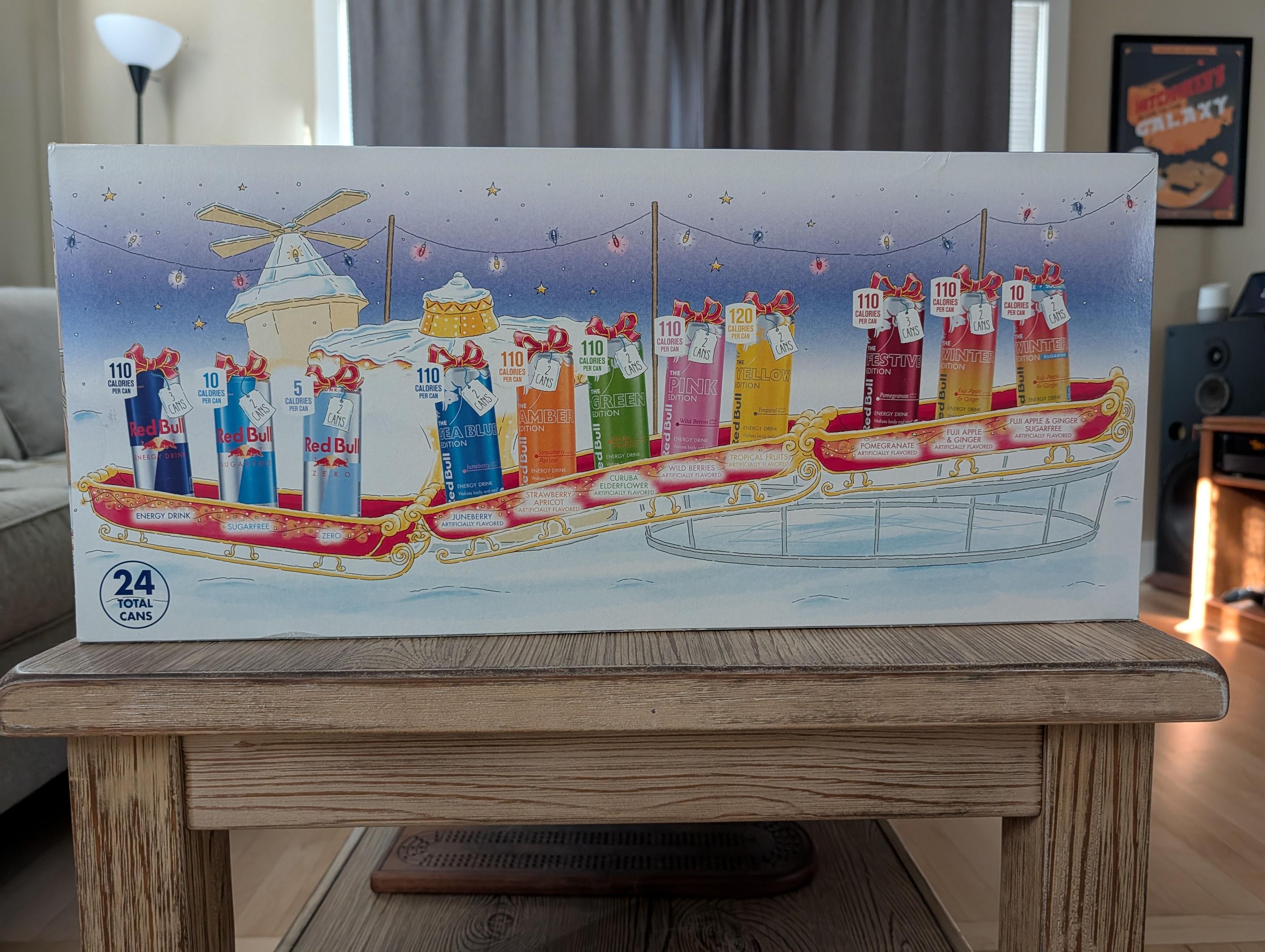 Red Bull cans in a festive sleigh illustration on a box.