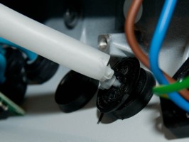 Washer to secure serial cable