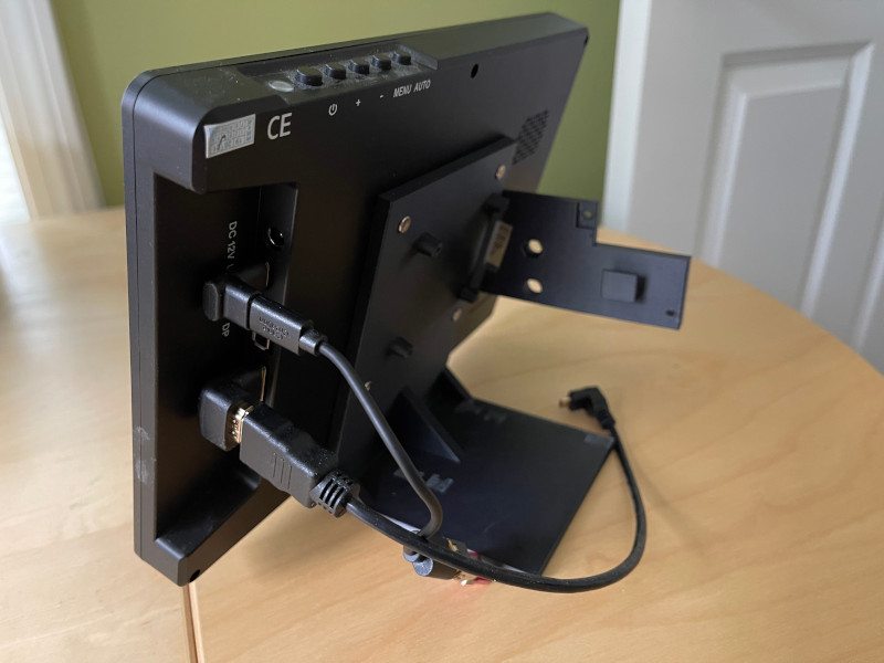 Stand attached to monitor, side view