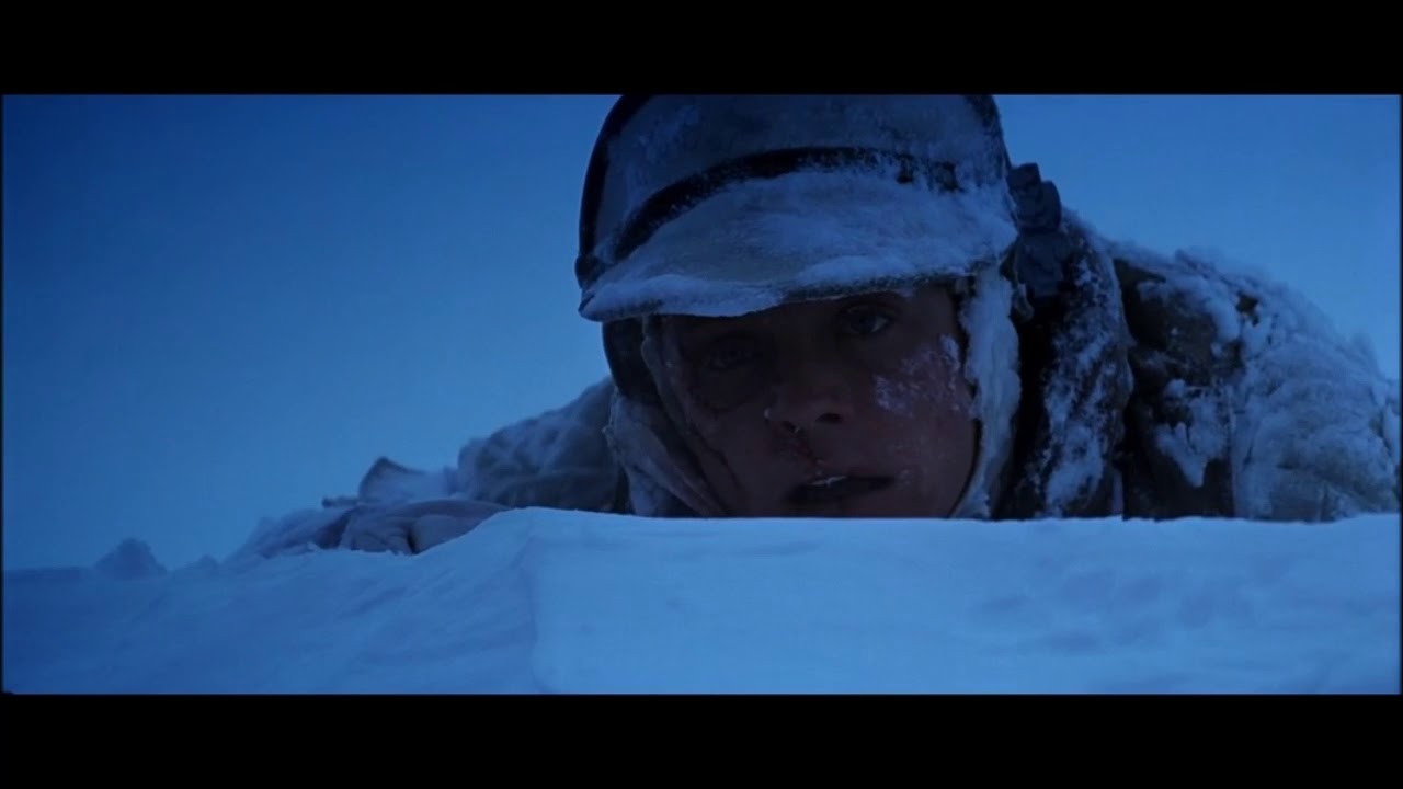 Luke Skywalker laying in the snow of Hoth, nearly dead.