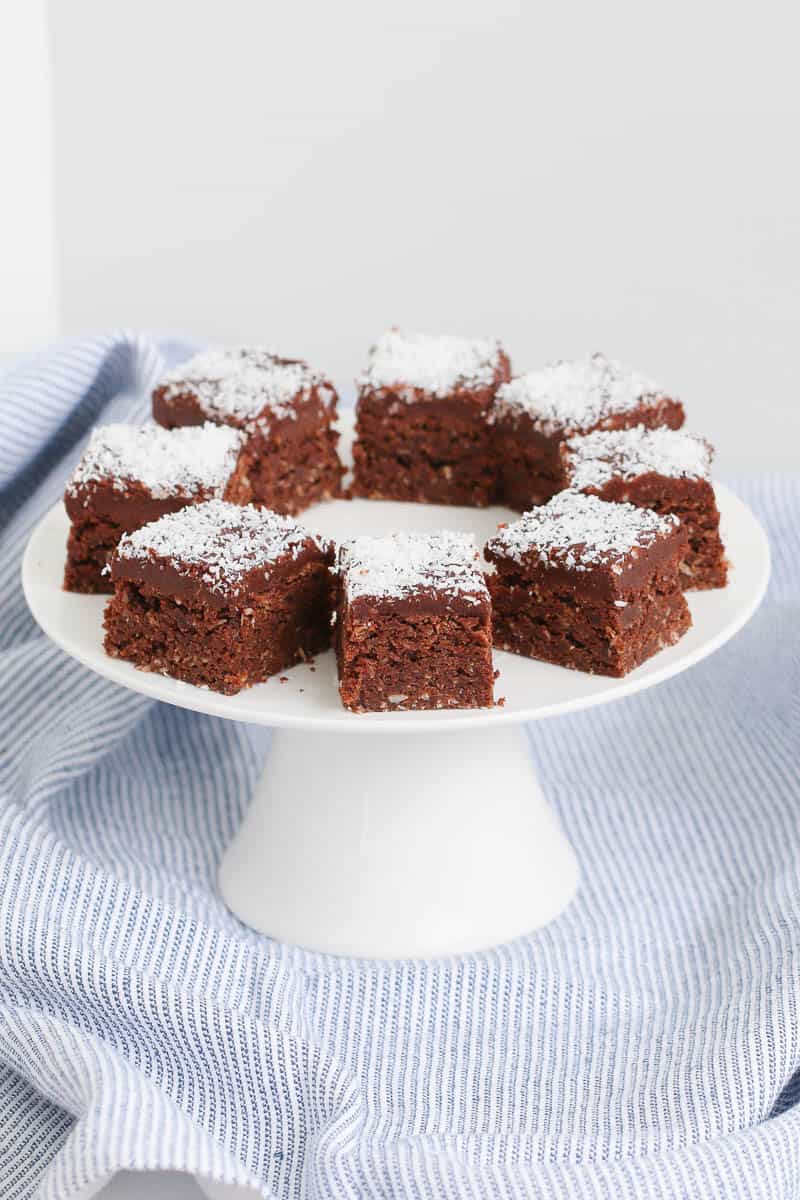 chocolate coconut slice arranged on a circluar tray