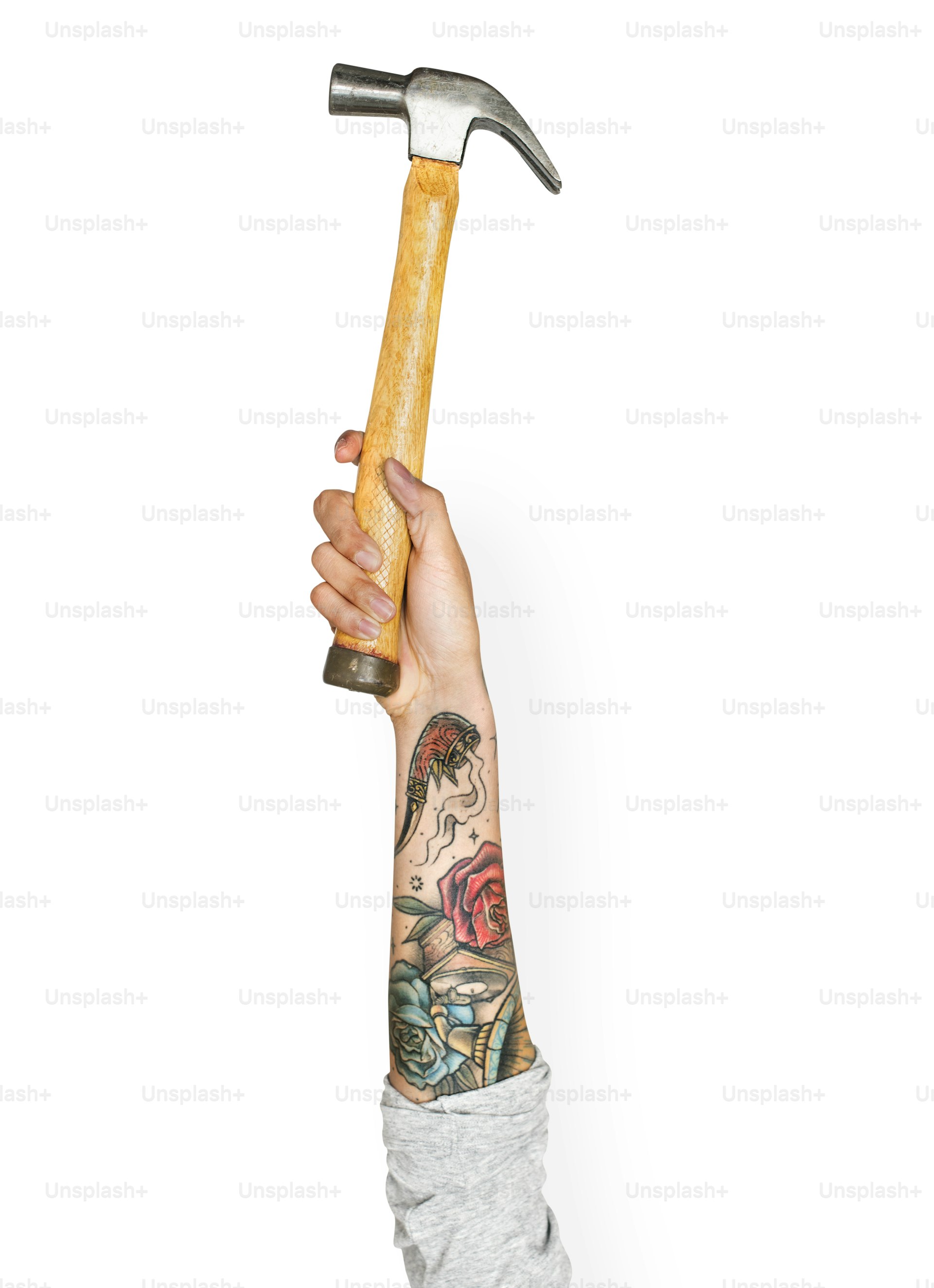 picture of a hand holding a hammer