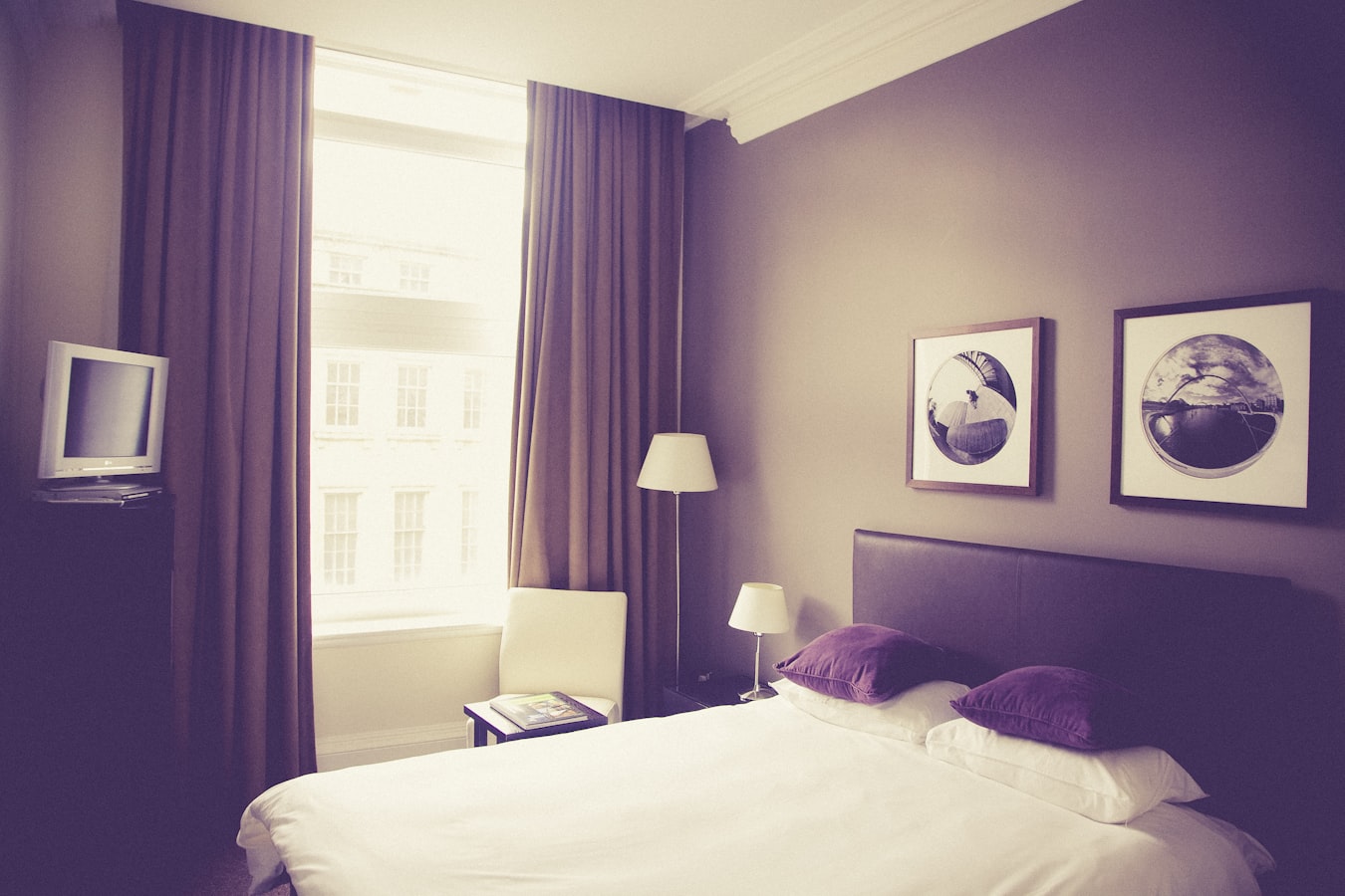 Picture of hotel room bed overlooking window