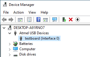 The board with the wrong driver installed, in Device Manager