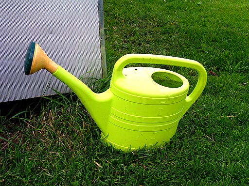 Green watering can