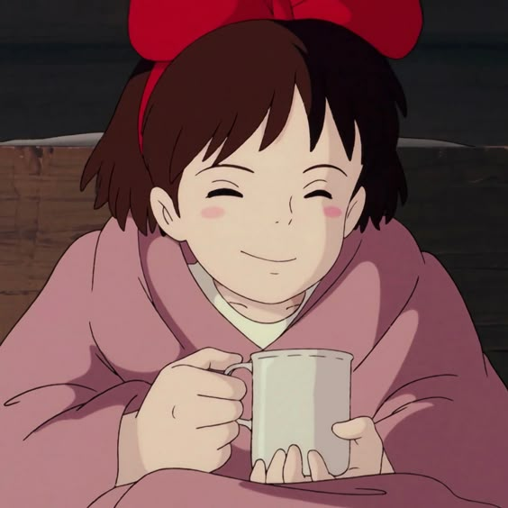 Kiki with a cup of coffee