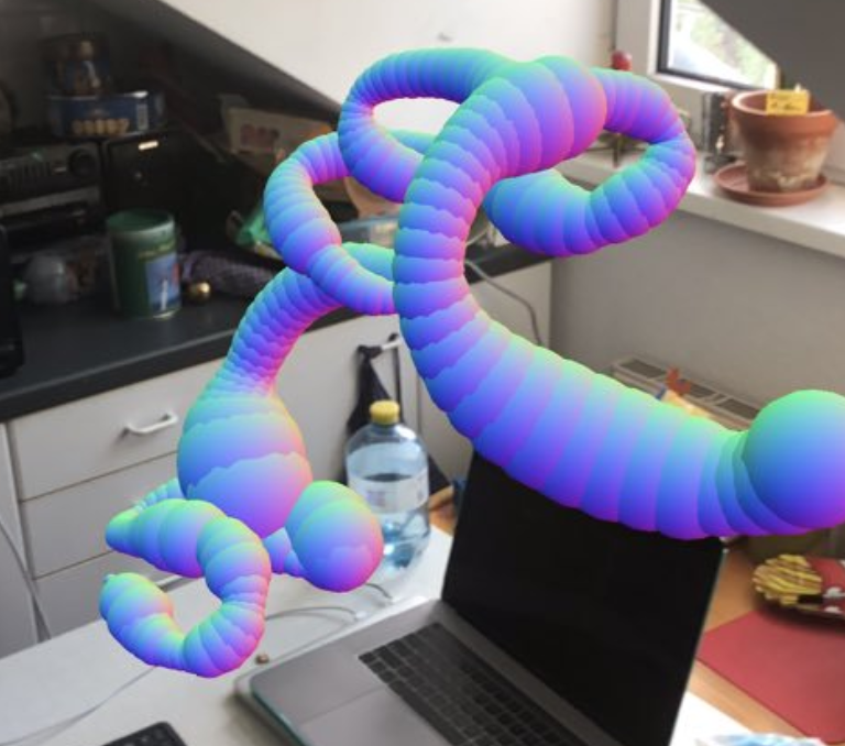 an image of blue & purple orbs making a trail using AR in a kitchen