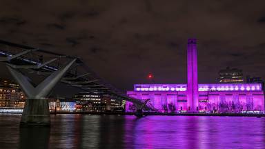 Tate Modern lit up for International Women's Day, London, England (© Stephen Chung/Alamy Stock Photo)