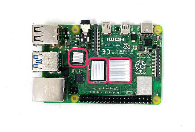 Place the three heatsink stickers on your raspberry pi