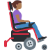 Woman in motorized wheelchair facing right: medium-dark skin tone