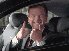 Neil Patrick Harris giving two thumbs up and grinning