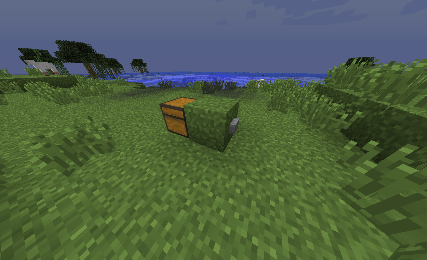 Image showing a button on a block behind a chest.