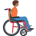 Person in manual wheelchair facing right: medium-dark skin tone