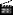U+1F3AC, U+FE808