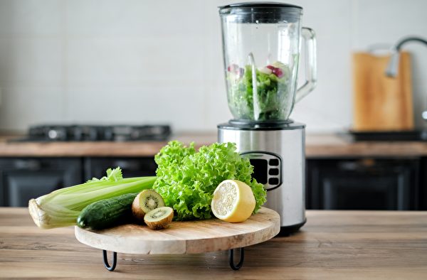 Blender With Ingredients For Smoothie And Products On Wooden Table