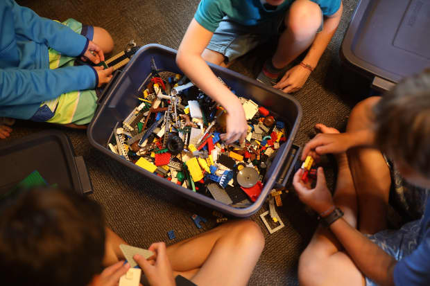 Camp Foley renovated a cabin built to store ice and made it into a Lego room. ‘The campers need a place to get away from it all for a little while,’ says camp director Alli Faricy. 