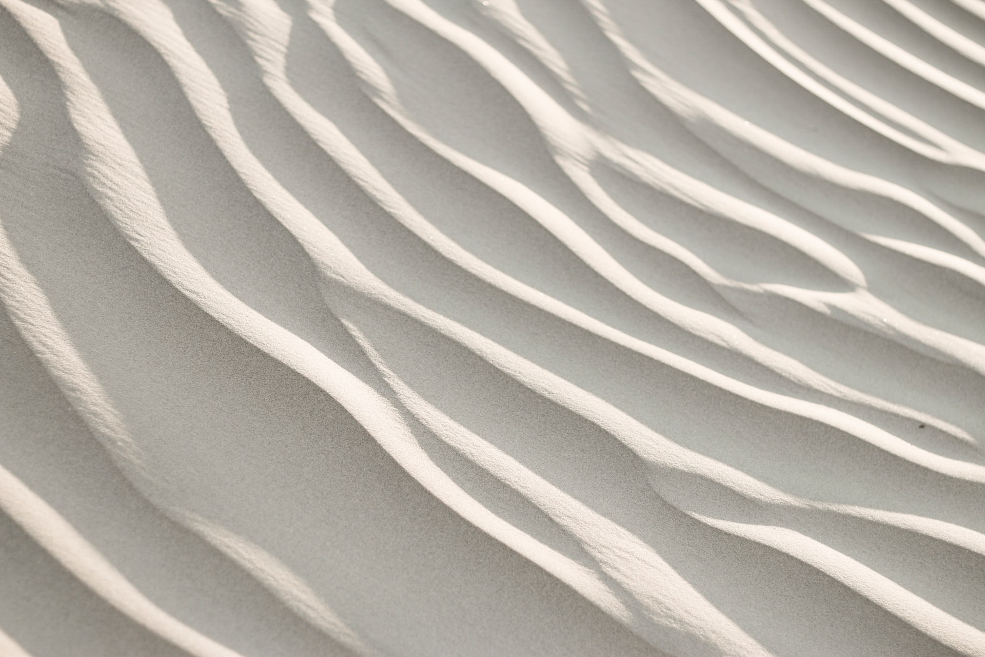 White wavy texture of a sand dune