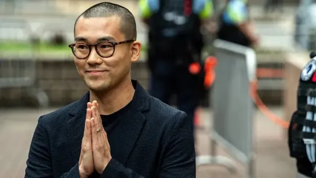 Michael Pang, a former pro-democracy district councilor, arrives at the West Kowloon Magistrates' Courts ahead of a verdict hearing for him and 46 other activists in Hong Kong, China, on Thursday, May 30, 2024. A Hong Kong court found 14 opposition divs guilty in the city's largest-yet national security trial that targeted scores of pro-democracy activists. Photographer: Lam Yik/Bloomberg via Getty Images