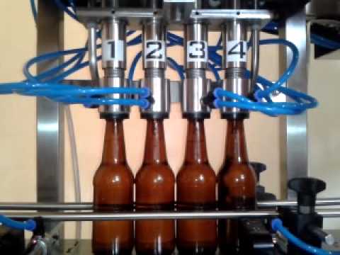 video embotelladora y tapadora