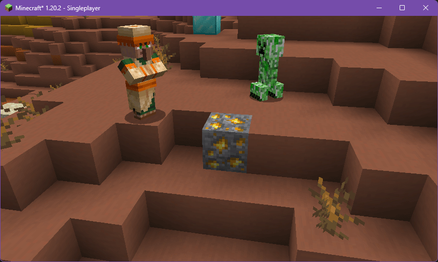 A GIF showing the player pinging blocks and entities, with a flashing hazard ping on a creeper.