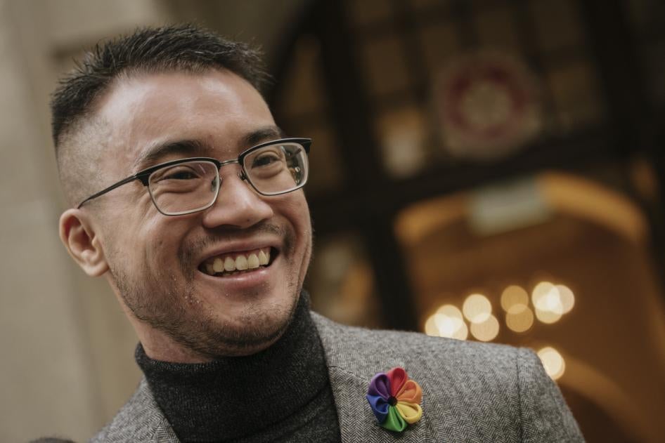 Transgender activist Henry Edward Tse speaks to reporters outside of Court of Final Appeal in Hong Kong.