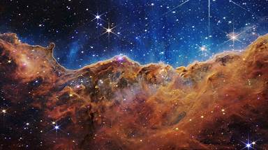 Cosmic Cliffs in the Carina Nebula (© NASA, ESA, CSA, and STScI)