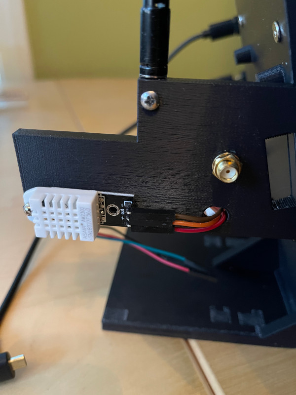 Side panel with components attached, temp/humidity sensor