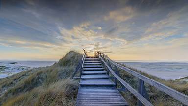 North Sea at sunset, Norddorf, Amrum Island, Germany (© Frederick Doerschem/Getty Images)