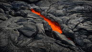 An active lava tube, Hawai'i Volcanoes National Park, Hawaii (© Tom Schwabel/Tandem Stills + Motion)
