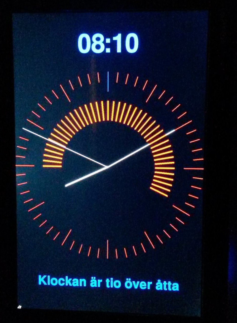 the piClock screen with a watch face and go-to-school indicator