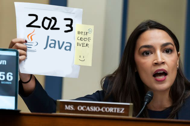 Cool pic of AOC holding a piece of paper