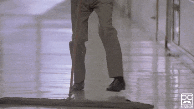 Christopher Walken dancing with a hallway broom