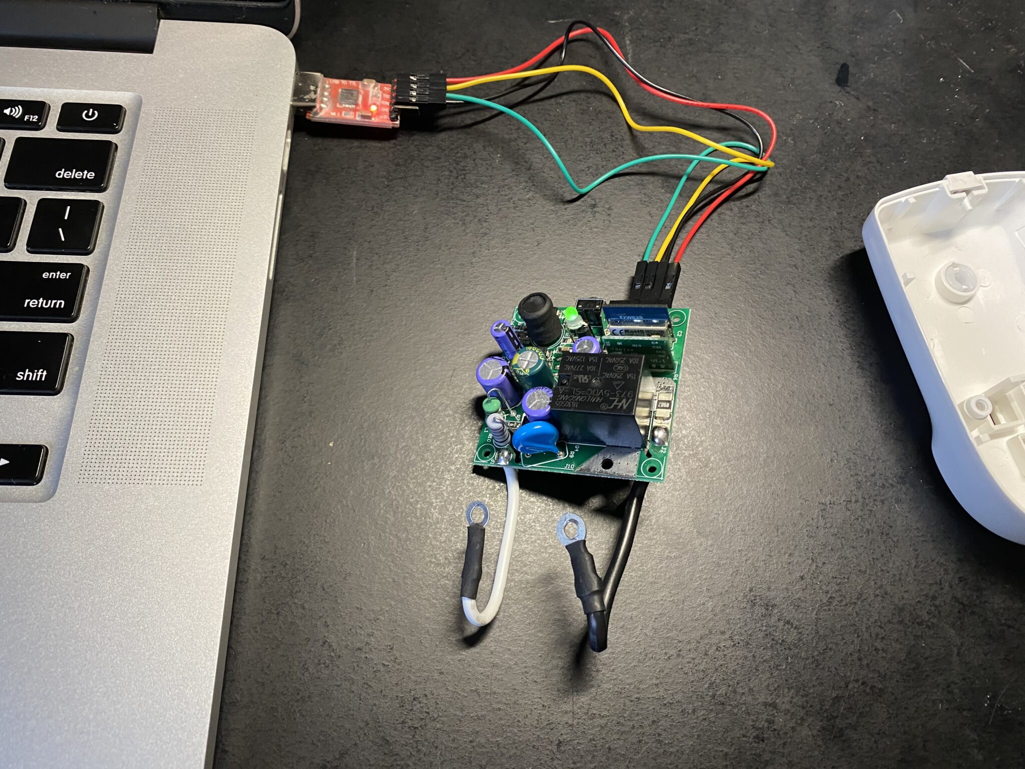 TYWE2S header connected to USB to TTL connector to flash with Arduino IDE